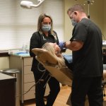 Dr. Molen working on patient in chair
